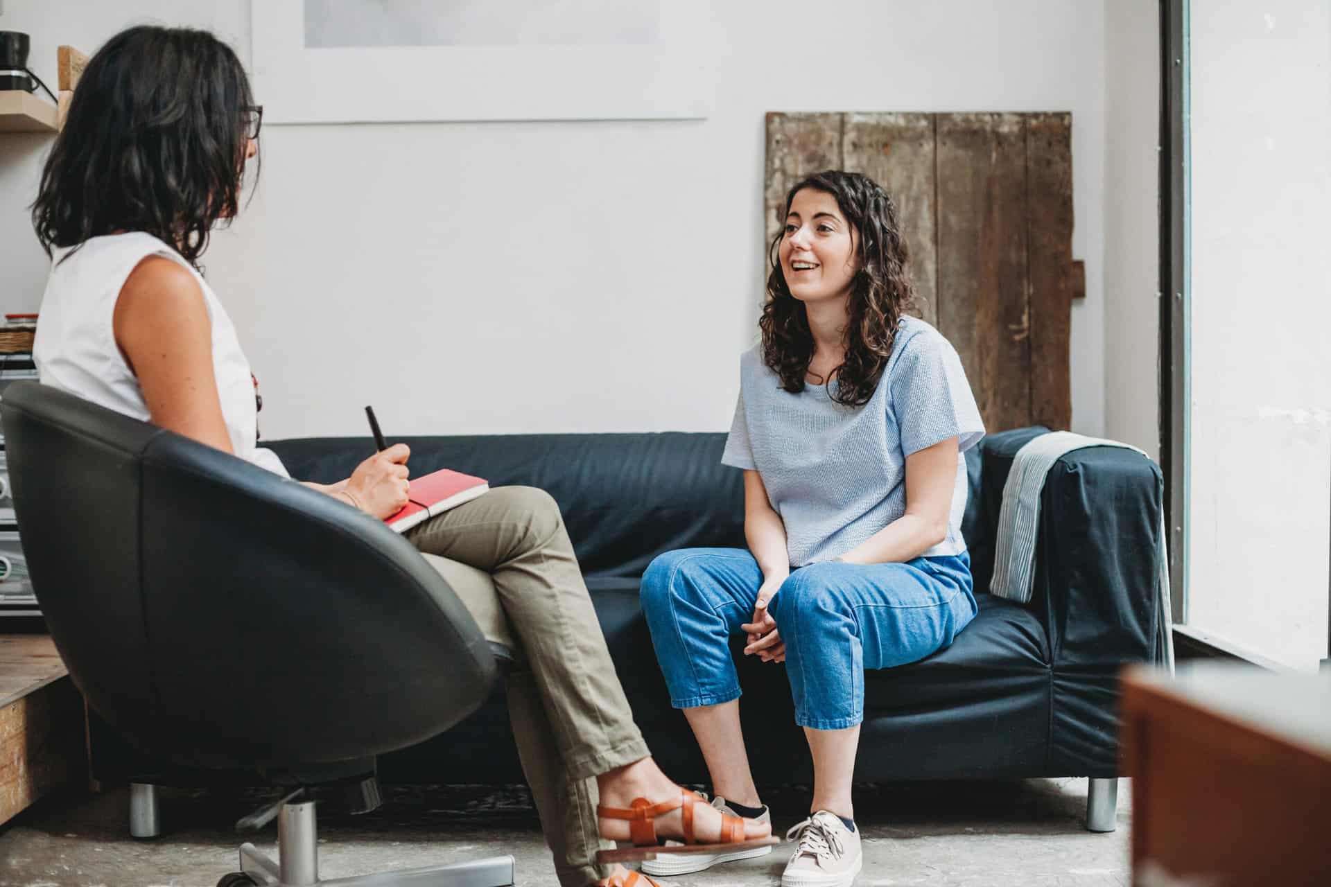 Psychotherapy session, woman talking to his psychologist in the