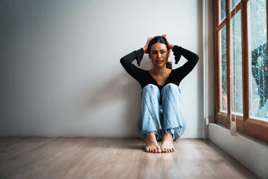 A woman who is in need of dual diagnosis treatment in California