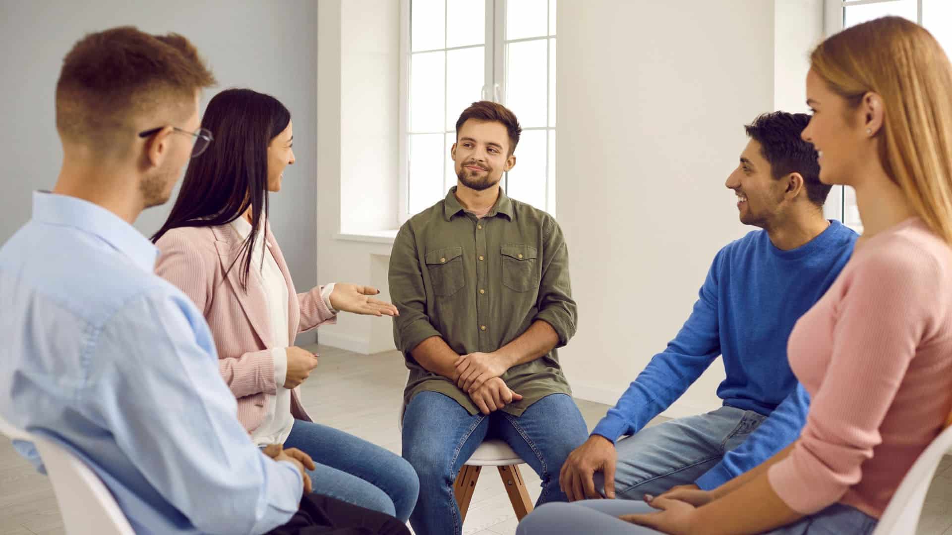 Group therapy session as part of trauma-informed care in California.
