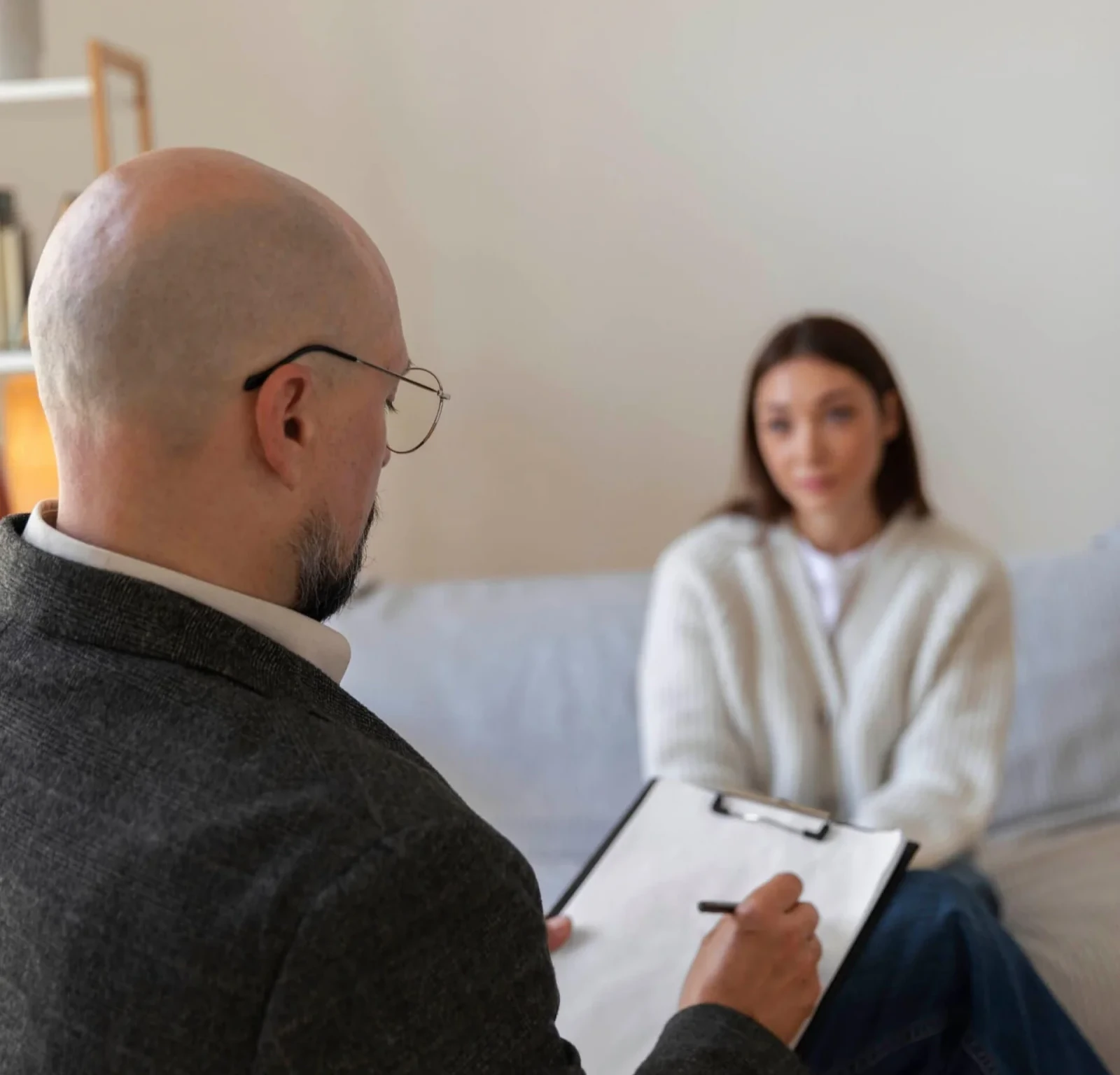 A therapist assesses a client during residential rehab in Concord, CA.
